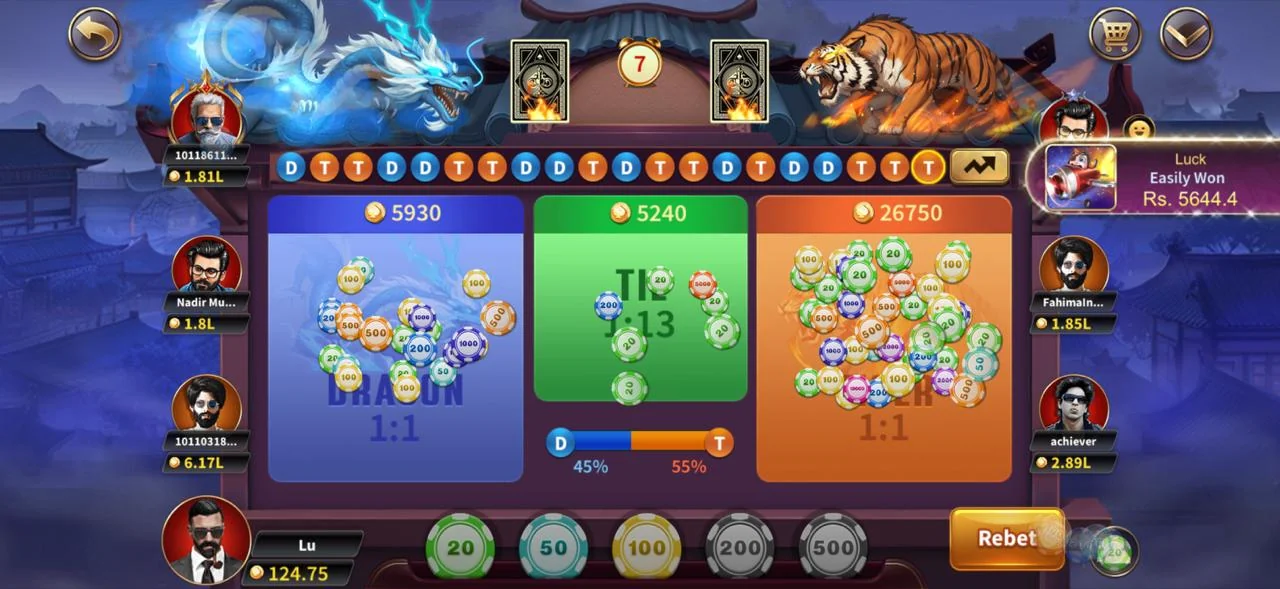 Royal X Casino — Games Lobby Royal X Casino Dragon Tiger live table with dragon and tiger sides, 45 vs 55 percent odds meter and PKR chip stack